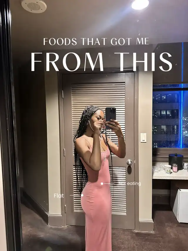 A woman in a pink dress stands in front of a mirror, showing her 'before' physique with text indicating 'Flat' glutes and 'Not eating' habits, as part of a glute transformation journey.